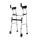 Silver foldable stand-up walker with black padded forearm supports, dual hand grips, adjustable aluminum legs, two front wheels, and rear gliding feet on a white background.