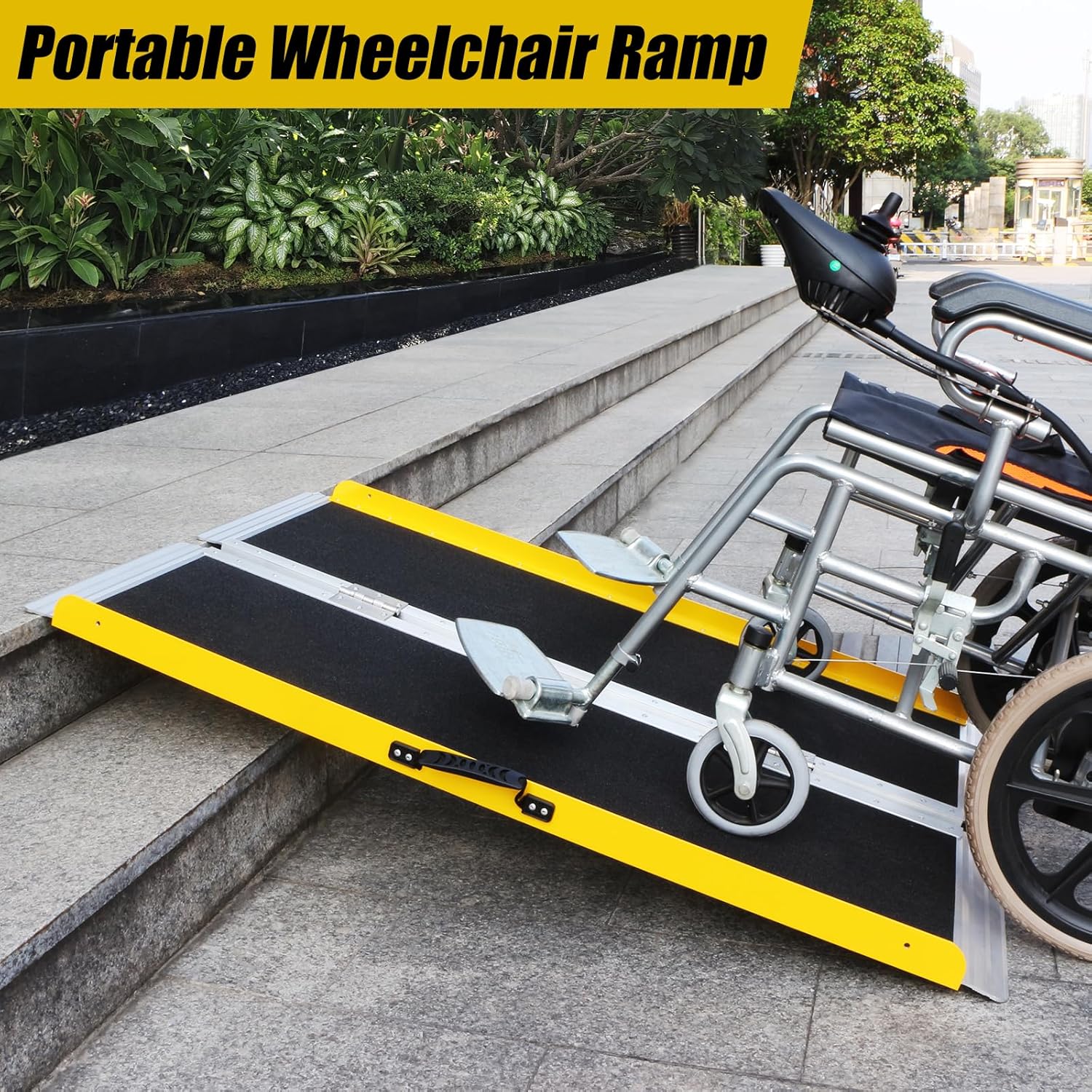 Electric wheelchair positioned on a 4-foot portable folding ramp bridging an outdoor step, showing the black non-slip surface and yellow raised side edges.