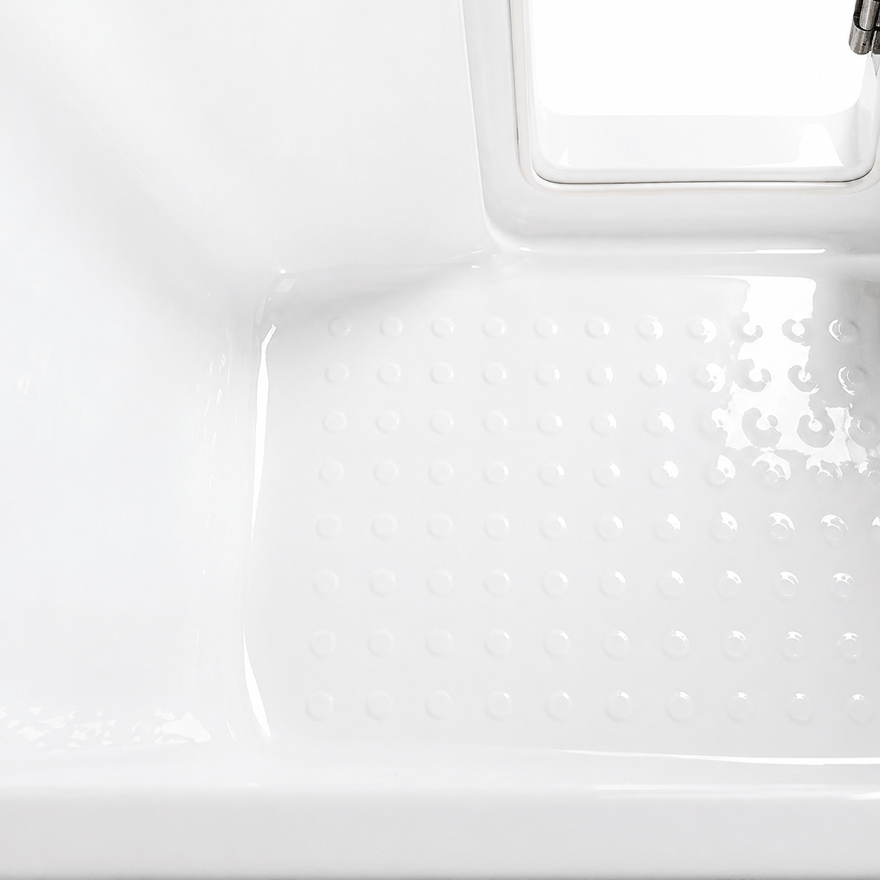 Textured non-slip floor inside the 60 in. deep soaking walk-in bathtub