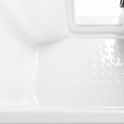 Textured non-slip floor inside the 60 in. deep soaking walk-in bathtub