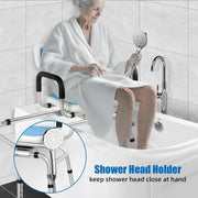 Older adult seated on a blue tub transfer bench inside a bathtub, holding a handheld shower head, with a close-up of the frame-mounted shower head holder.