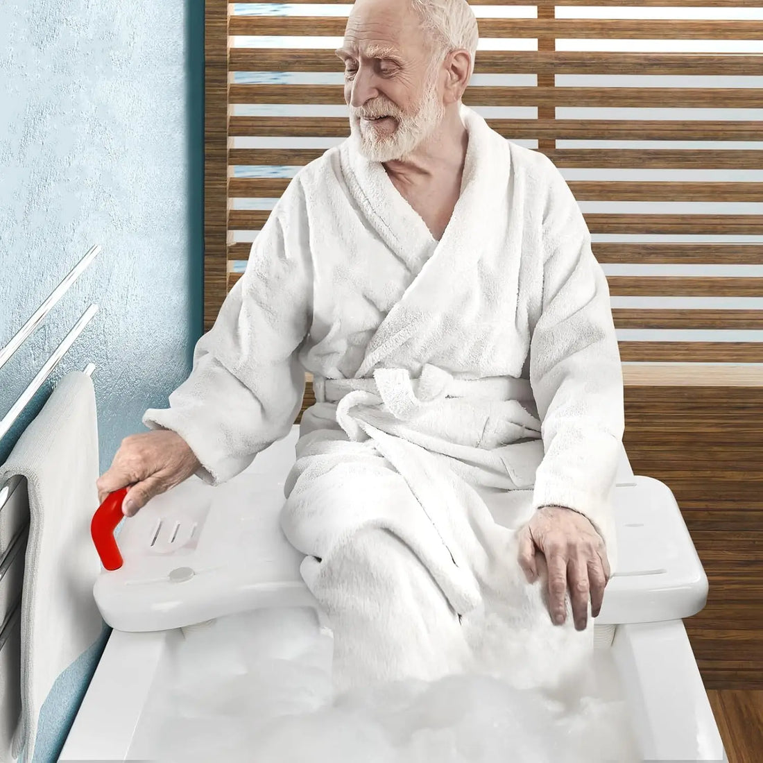 Man in a white robe using a white and red device on a bathtub shower bench.
