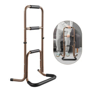 Brown aluminum stand assist with three padded grips and a wide base, shown beside an inset of a person using the handles to stand in front of a sofa.
