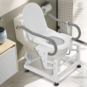Dual-motor electric toilet lift seat installed around a white toilet in a bathroom, showing the open lid, padded armrests, steel frame, and lifting actuators.