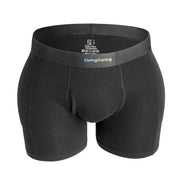 Black hip protector underwear for seniors, front view, with a Living Caring waistband, contoured front pouch, and integrated hip padding.